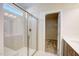 Modern bathroom with a glass-enclosed shower and a walk-in closet at 68 Victory View Ter, Smithfield, NC 27577