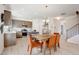 Stylish eat-in kitchen boasts stainless appliances, modern countertops, and a center island with seating at 68 Victory View Ter, Smithfield, NC 27577