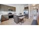 Well-equipped kitchen featuring stainless appliances, a center island, and ample cabinet space at 68 Victory View Ter, Smithfield, NC 27577