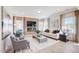 Modern living room with fireplace, television, and ample seating at 68 Victory View Ter, Smithfield, NC 27577