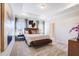 Elegant main bedroom with stylish decor, tray ceiling, and ample lighting at 68 Victory View Ter, Smithfield, NC 27577