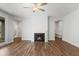 Inviting living room with hardwood floors and a cozy fireplace at 741 Aristocrat Ln, Knightdale, NC 27545