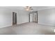 Generous main bedroom featuring a ceiling fan, on-suite bathroom, and a walk-in closet for ultimate comfort and convenience at 741 Aristocrat Ln, Knightdale, NC 27545