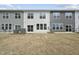 Townhome backyard with a private outdoor space, patio, and lawn area at 84 Ripple Way # 313, Clayton, NC 27520