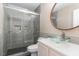 Modern bathroom featuring a glass-enclosed shower and stylish vessel sink at 89 Bison Ln, Lillington, NC 27546