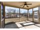 Relaxing covered patio with ceiling fan and views of backyard at 89 Bison Ln, Lillington, NC 27546