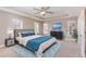 Tranquil main bedroom featuring tray ceiling, a plush bed and calming color palette at 89 Bison Ln, Lillington, NC 27546
