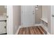 Welcoming mudroom features wood-look flooring and a convenient built-in bench at 89 Bison Ln, Lillington, NC 27546