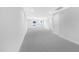 Spacious bonus room with gray carpet and ample natural light at 905 Myers Point Dr, Morrisville, NC 27560