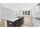 Spacious kitchen with a large island, modern appliances, and ample counter space at 905 Myers Point Dr, Morrisville, NC 27560