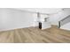 Open-concept space featuring a modern kitchen with white cabinetry and stainless steel appliances at 905 Myers Point Dr, Morrisville, NC 27560
