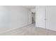 Inviting bedroom showcases neutral carpet and a closet with double doors at 907 Field Ivy Dr, Fuquay Varina, NC 27526