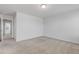 Cozy bedroom features neutral carpet and direct access to an adjacent room at 907 Field Ivy Dr, Fuquay Varina, NC 27526
