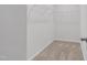 Walk-in closet with built-in wire shelving for optimal storage and organization at 907 Field Ivy Dr, Fuquay Varina, NC 27526