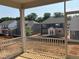 View from the screen back porch showing new houses under construction in the neighborhood at 97 Willow Cameron Way, Angier, NC 27501
