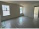 Bright bedroom with dual windows overlooking the neighborhood, awaiting your personal touch at 97 Willow Cameron Way, Angier, NC 27501