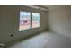 Bedroom featuring ample natural light with two windows at 97 Willow Cameron Way, Angier, NC 27501