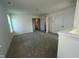 An ample bedroom showcases neutral carpet, white walls, and ensuite bathroom access at 97 Willow Cameron Way, Angier, NC 27501