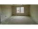 Spacious bedroom with natural light from two windows at 97 Willow Cameron Way, Angier, NC 27501
