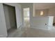 Hallway showing doors and access to other rooms with natural light. New home construction at 97 Willow Cameron Way, Angier, NC 27501