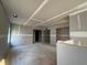 Spacious unfinished living room with multiple doorways and ample natural light at 97 Willow Cameron Way, Angier, NC 27501