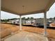 Covered patio view of neighborhood highlighting the new home construction and spacious lot at 97 Willow Cameron Way, Angier, NC 27501