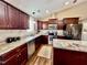 Stylish kitchen featuring stainless steel appliances, an island, and plenty of cabinet space at 102 Westchase Dr, Clayton, NC 27527