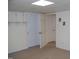 Finished basement area with multiple doors at 105 Lake Rd, Henderson, NC 27537