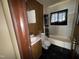 Modest bathroom with standard fixtures, including a toilet, sink, and shower/tub combination at 107 Creel St, Chapel Hill, NC 27516