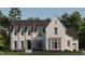 Beautiful white brick two-story home with a gray roof, lush landscaping, and an inviting entrance at 13533 Old Creedmoor Rd, Wake Forest, NC 27587
