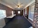 This is a great sun room featuring a ceiling fan and natural light, and walls of windows at 1926 W Front St, Burlington, NC 27215