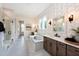 Gorgeous bathroom with double vanity, soaking tub, stand alone shower and elegant wall coverings at 1964 Old Byre Way, Apex, NC 27502