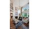 Comfortable living room with shiplap walls, fireplace, hardwood floors, and natural light at 1964 Old Byre Way, Apex, NC 27502