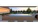 A spacious pool with deck, trees and fence for privacy at 214 Reynolds Rd, Raleigh, NC 27609