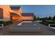 A modern outdoor space with a pool, fire pit, and seating area is ready for entertainment at 214 Reynolds Rd, Raleigh, NC 27609