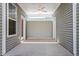 Relaxing covered patio for outdoor enjoyment at 272 White Oak Garden Way # 209, Garner, NC 27529