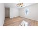 Spacious bedroom with wood-look flooring and a ceiling fan at 2801 Quince Dr, Raleigh, NC 27610