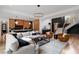Open-concept living area seamlessly connects the living room, staircase, and kitchen at 299 Seaforth Landing Dr, Pittsboro, NC 27312