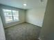 The bedroom has green carpet at 3024 Freewinds Way # 49, Cary, NC 27519