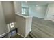 View from stairs, open floor plan with hard wood floors at 3024 Freewinds Way # 49, Cary, NC 27519