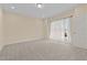 Bright bedroom with plush carpet, soft light, and a serene atmosphere that makes it a relaxing retreat at 406 Stewart Town Rd, Lillington, NC 27546