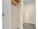 Empty walk-in closet with adjustable shelving, and neutral-toned carpet at 406 Stewart Town Rd, Lillington, NC 27546