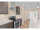 Stylish kitchen featuring stainless steel appliances, ample counter space, and neutral tones at 406 Stewart Town Rd, Lillington, NC 27546