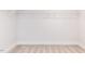 Spacious walk-in closet with neutral carpeting, white walls and ample metal shelving for optimal storage at 456 Barbour Farm Ln, Four Oaks, NC 27524