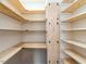 Well-organized pantry with custom wood shelving at 4664 Quarter Creek Ln, Liberty, NC 27298