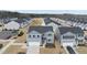 Beautiful aerial view of a two-story home, showcasing its landscaping and neighborhood at 4806 Flat Bastion Dr, Raleigh, NC 27610