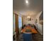Dining room with modern lighting and large windows at 5943 River Landings Dr, Raleigh, NC 27616