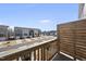 Scenic view from a private wooden deck, overlooking a residential street at 6318 Perry Creek Rd, Raleigh, NC 27616