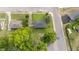 Overhead view displaying the house with its spacious yard and a network of neighborhood roads at 702 Joyner St, Clayton, NC 27520