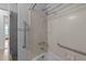 Close-up on a shower/tub combo featuring support bars at 702 Joyner St, Clayton, NC 27520